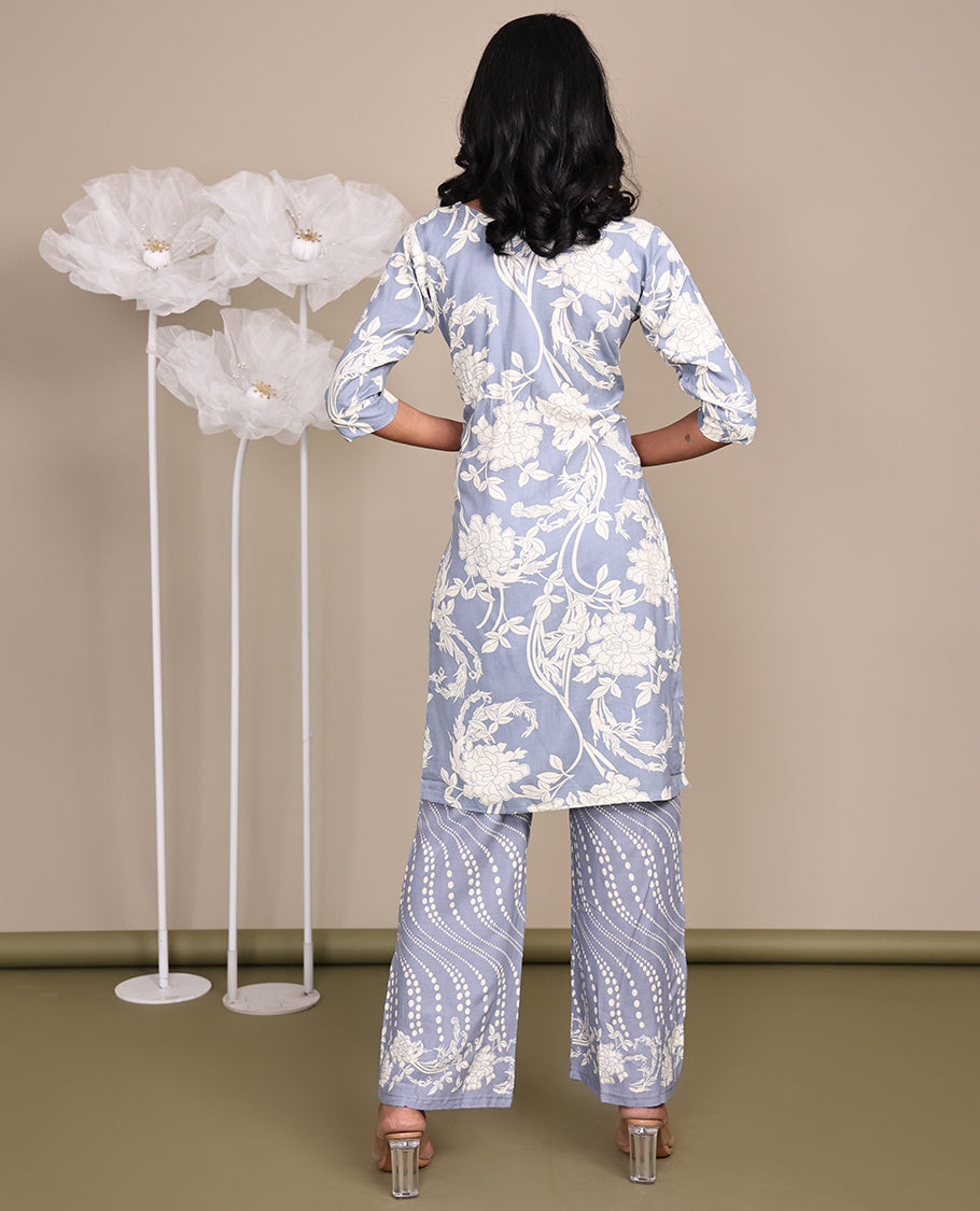 Grey Cotton Ready-Made Suit, Featuring Floral Print, a Round Front Neckline, 3/4 Sleeves, and a Straight-Cut Top, Paired with Geometric Printed Straight-Cut Pants