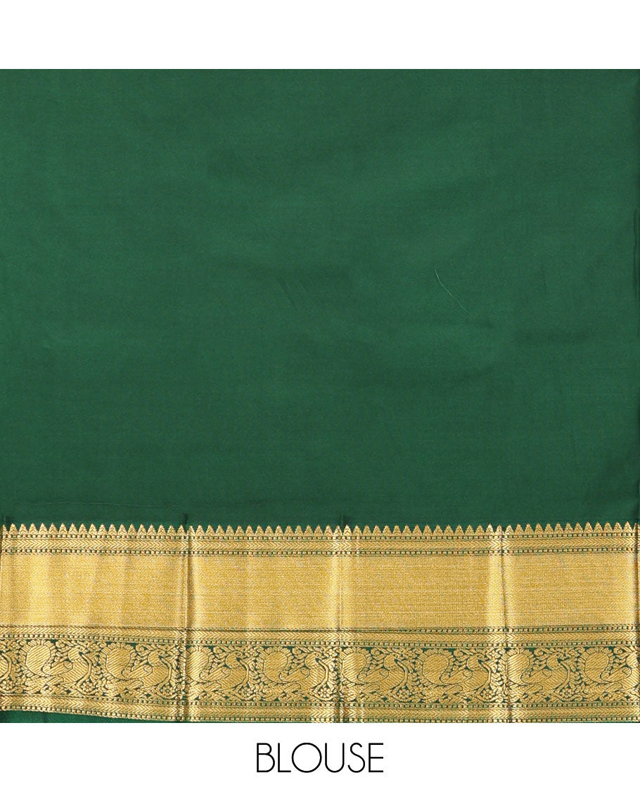Yellow Budget Silk Saree, Richly Detailed with Zari Muthu, and Zari Buttas on Its Body, Complemented by a Contrast Traditional Zari Design Border of Peacock Designs, Gleaming Jaal Pallu, and Paired with a Contrast Blouse