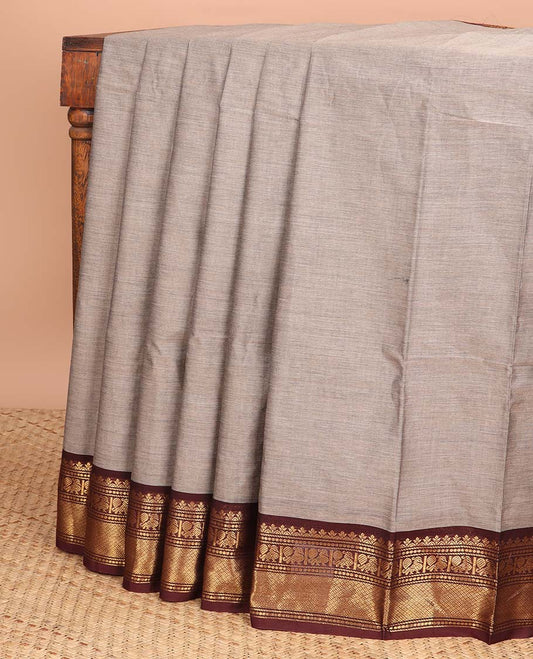 Grey chettinad cotton saree with contrast peacock, gatti design border