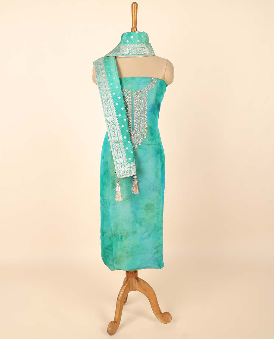 Blue material chudidhar set, abstract print & embroidered top, plain bottom & Banaras buttas duppata