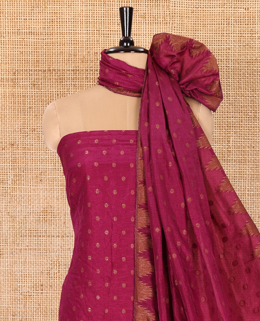 Magenta Material Chudidar Set Embellished with 1000 Zari Buttas Woven Banaras Top, Subtly Made Plain Santoon Bottom, and a Banarasi Dupatta Featuring Zari Buttas and Temple Buttas