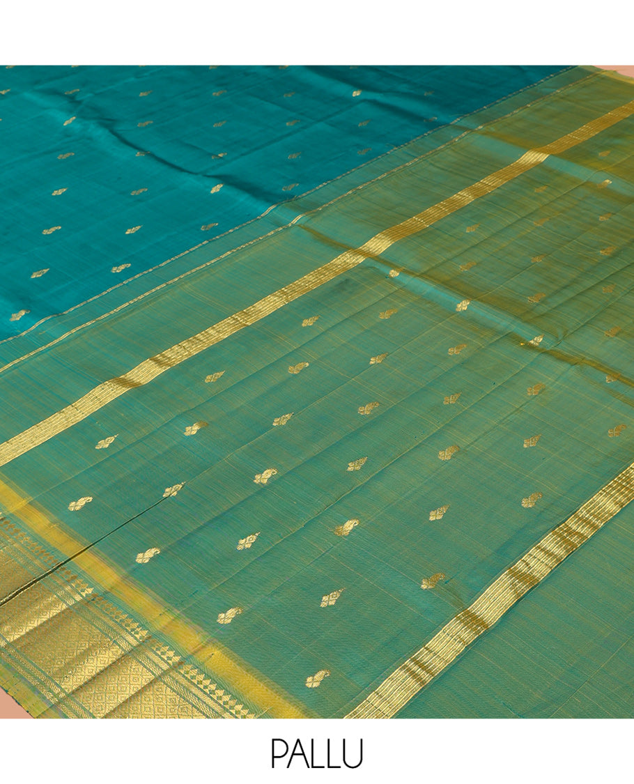 Green Kanchipuram Silk Saree, Adorned with Zari Buttas, Complemented by a Contrast Border of Panner Sombu, Banaras, and Mayil Kann Design, Pallu of Zari Design, and No Blouse