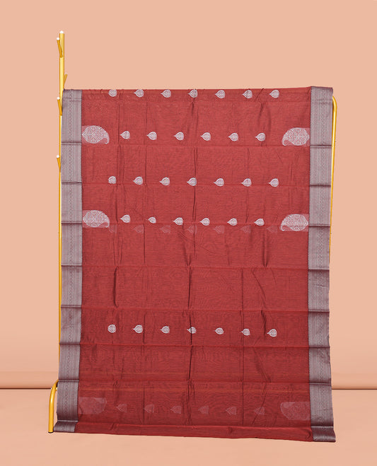 Maroon Semi-Silk Cotton Saree, Delicately Designed with Buttas All Over Its Body, Traditional Design Border of Paisleys, Geometric-Patterned Pallu, and Paired with a Matching Blouse