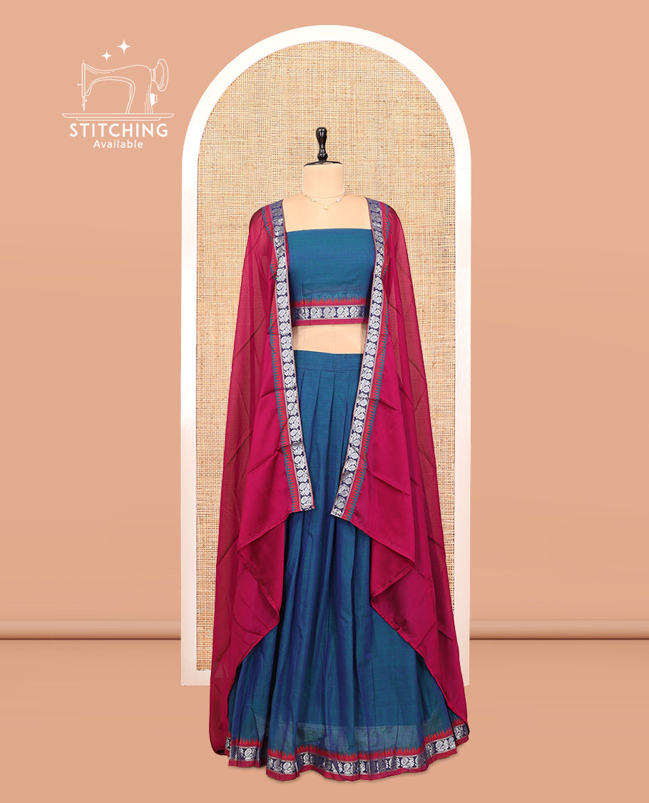 Blue Cotton Half-Saree Features Plain Skirt, a Contrast Peacock Temple Border, a Matching Blouse, and a Contrast Dhavani