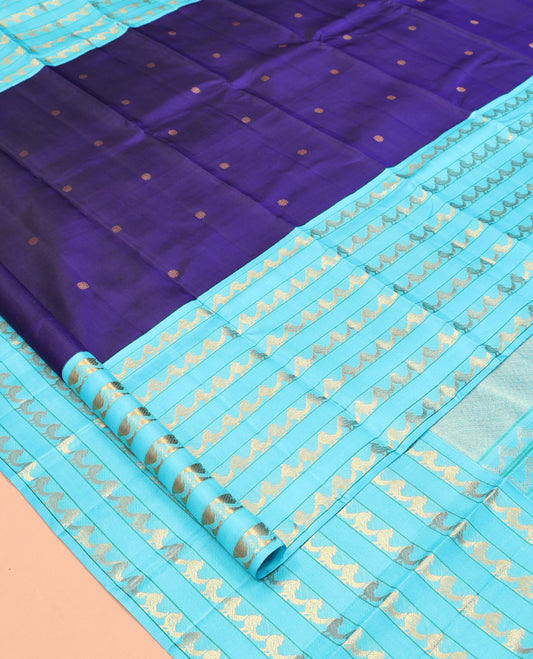 Blue Kanchipuram Designer Silk Saree, Opulently Embellished with Zari Buttas, a Contrast Border Steeped with Kili Designs, Zari-Woven Pallu, and a Contrast Blouse
