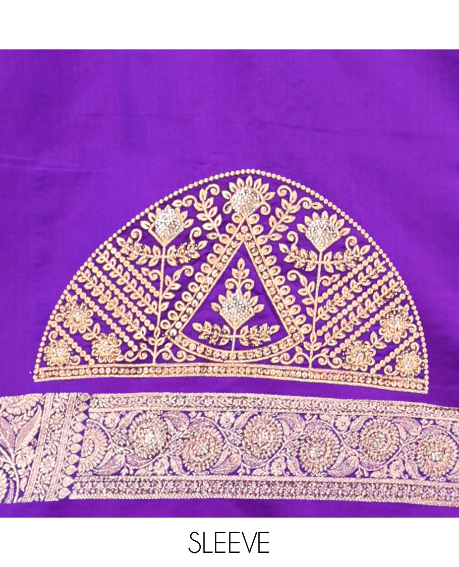 Violet Banarasi Satin Saree, Elevated with Zari Buttas, a Floral Creeper Border, Intricate Stonework Pallu, and a Matching Blouse