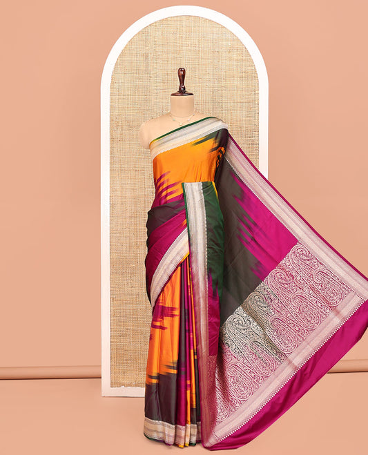 Multi-Color Banarasi Silk Saree, Gracefully Embellished with Colorful Ikkat Weave on Its Body, Highlighted by a Self-Border of Traditional Designs, Pallu of Big Paisley Designs, and Paired with a Matching Jacquard Blouse