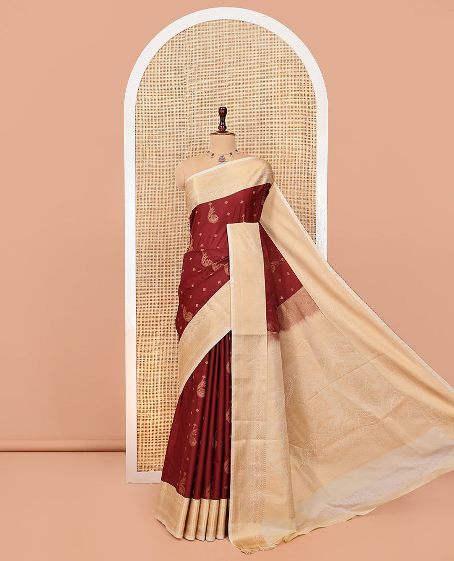 Maroon-Cream Budget Silk Saree, Adorned with Kolam and Floral Buttas, a Contrast Traditional Zari Border, Grand Pallu, and a Contrast Blouse