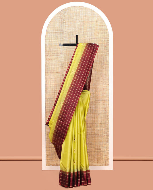 Yellow Kanchipuram Silk Saree, Sparsely Woven with Buttas and Stripes, Contrast Zari Striped Border, Pallu of Intricate Design, and a Contrast Blouse