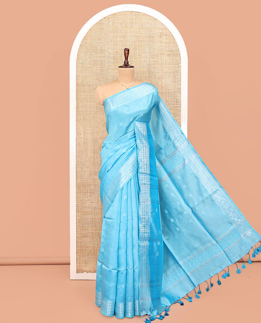 Blue Banana Pith Saree, Subtly Sparkled with Square Buttas All Over Its Body, Sparsely Woven Temple Border of Rudraksham Designs, Pallu of Buttas, and Paired with a Matching Blouse