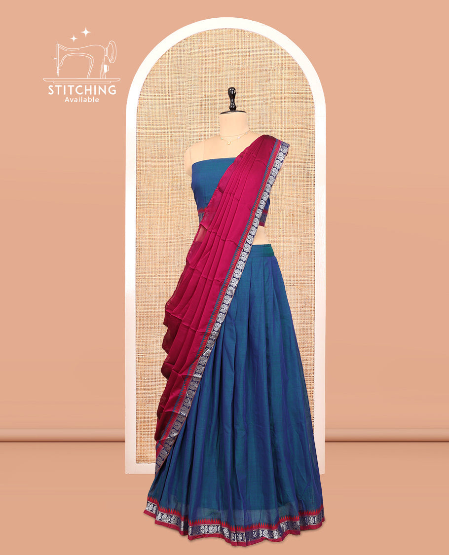 Blue Cotton Half-Saree Features Plain Skirt, a Contrast Peacock Temple Border, a Matching Blouse, and a Contrast Dhavani