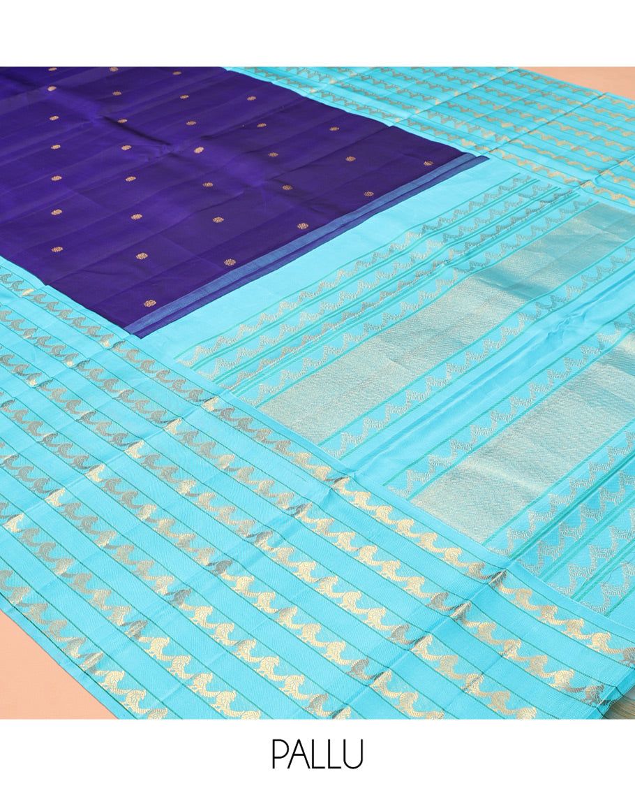 Blue Kanchipuram Designer Silk Saree, Opulently Embellished with Zari Buttas, a Contrast Border Steeped with Kili Designs, Zari-Woven Pallu, and a Contrast Blouse