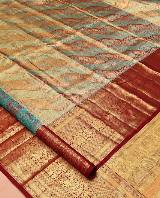 Blue Kanchipuram Tissue Silk Saree, Beautifully Bedecked with Meenakari Jacquard, a Contrast Border of Kodi Visiry, Jaal, and Mayil Designs, Diagonal Striped Pallu, and Contrast Blouse