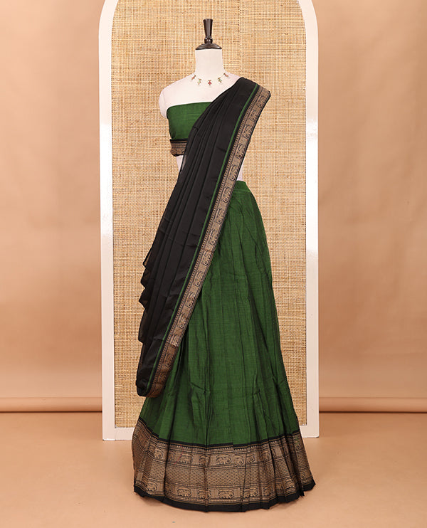 Leaf green with black cotton half saree with contrast elephant design border,elephant design blouse & zari design border dhavani