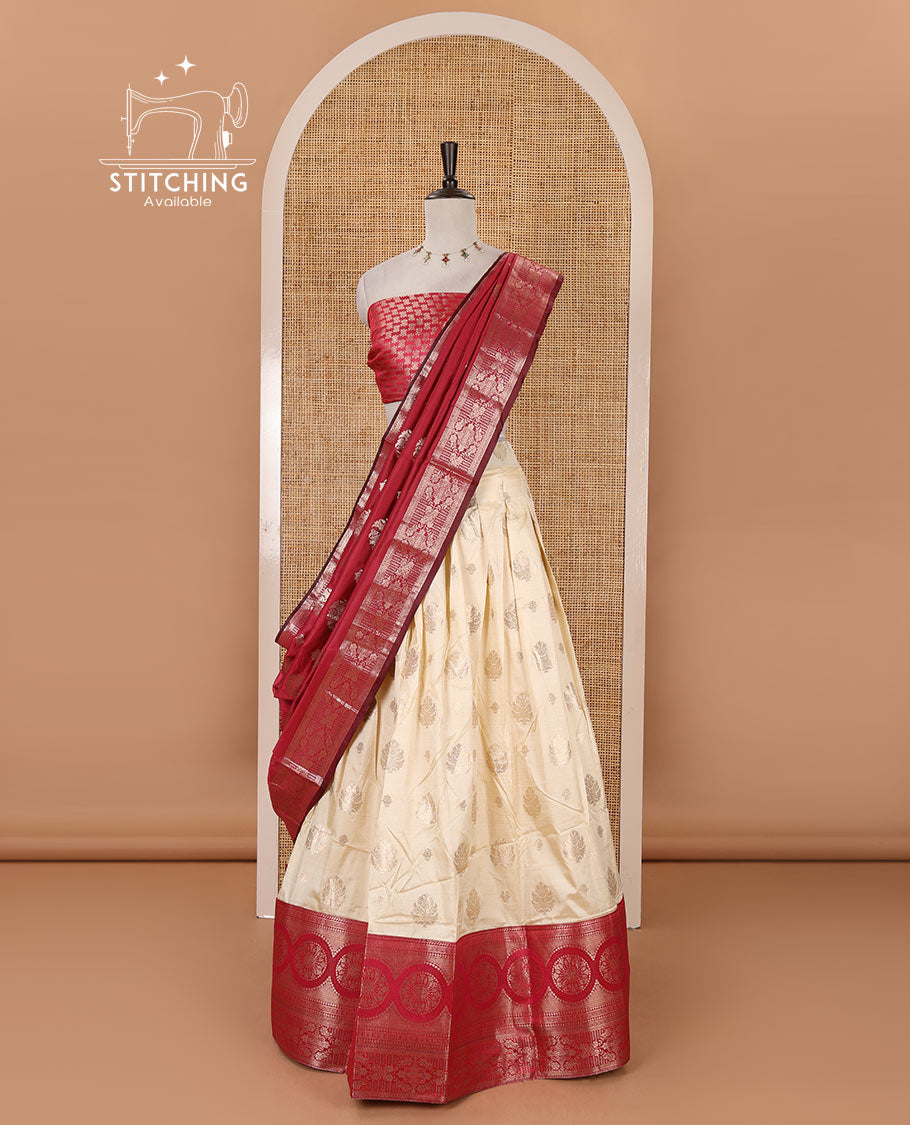 Cream-rani pink semi-banaras half-saree, zari buttas & contrast traditional zari border skirt, jacquard blouse & intricately zari woven dhavani