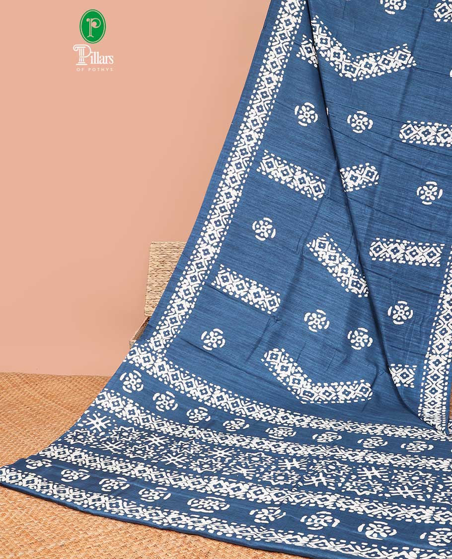 Borderless Blue all-over pathick print with rich printed pallu & small butta pathick printed blouse