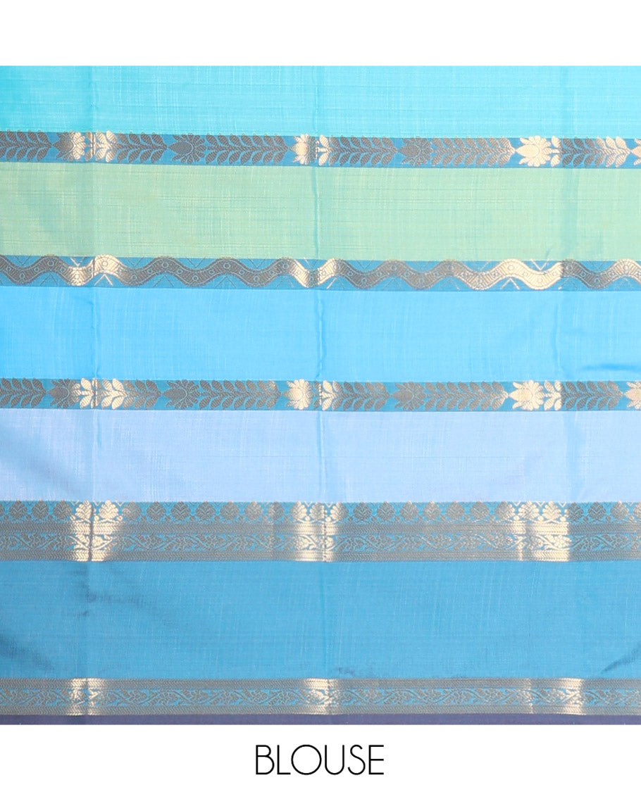 Multi Color Semi-Soft Silk Saree, Richly Detailed with Multi-color Stripes and Traditional Zari Designs On Its Body, Complemented by Contrast Rettai Pettu Traditional Zari Designs Woven Border, Grand Pallu and Paired with a Contrast Blouse
