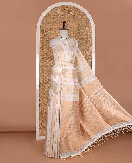 Borderless half-white traditional zari motifs steeped elite soft silk saree, floral jaal pallu, and matching zari buttas woven blouse