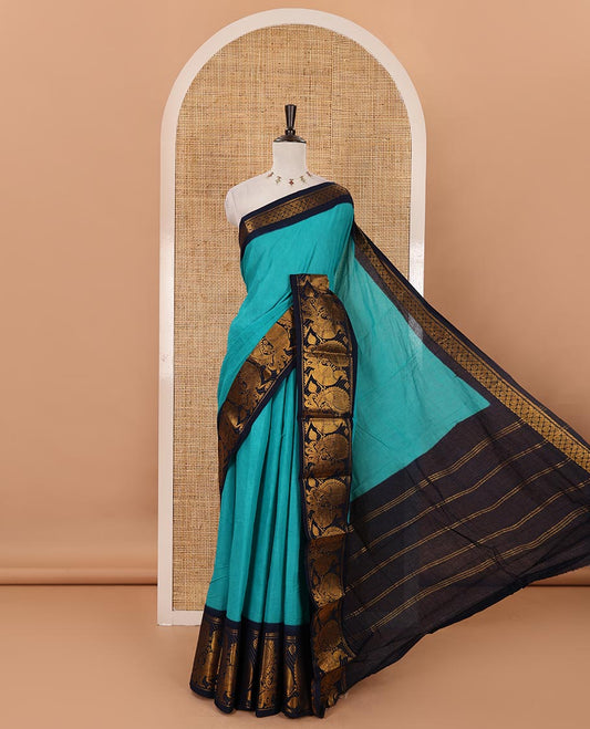Blue plain sungudi cotton saree, contrast big annam motifs woven zari border, zari striped pallu & zari design blouse