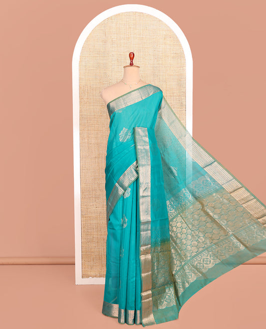 Blue Silk Cotton Saree, Bedecked with Zari Buttas All Over Its Body, Complemented by a Contrast Traditional Zari Design Border, Pallu Steeped with Geometric Designs, and Paired with a Contrast Blouse