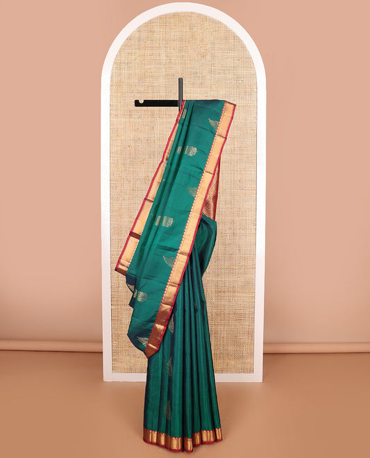 Green buttas vasundhara elite silk saree with contrast temple border & geometric design pallu