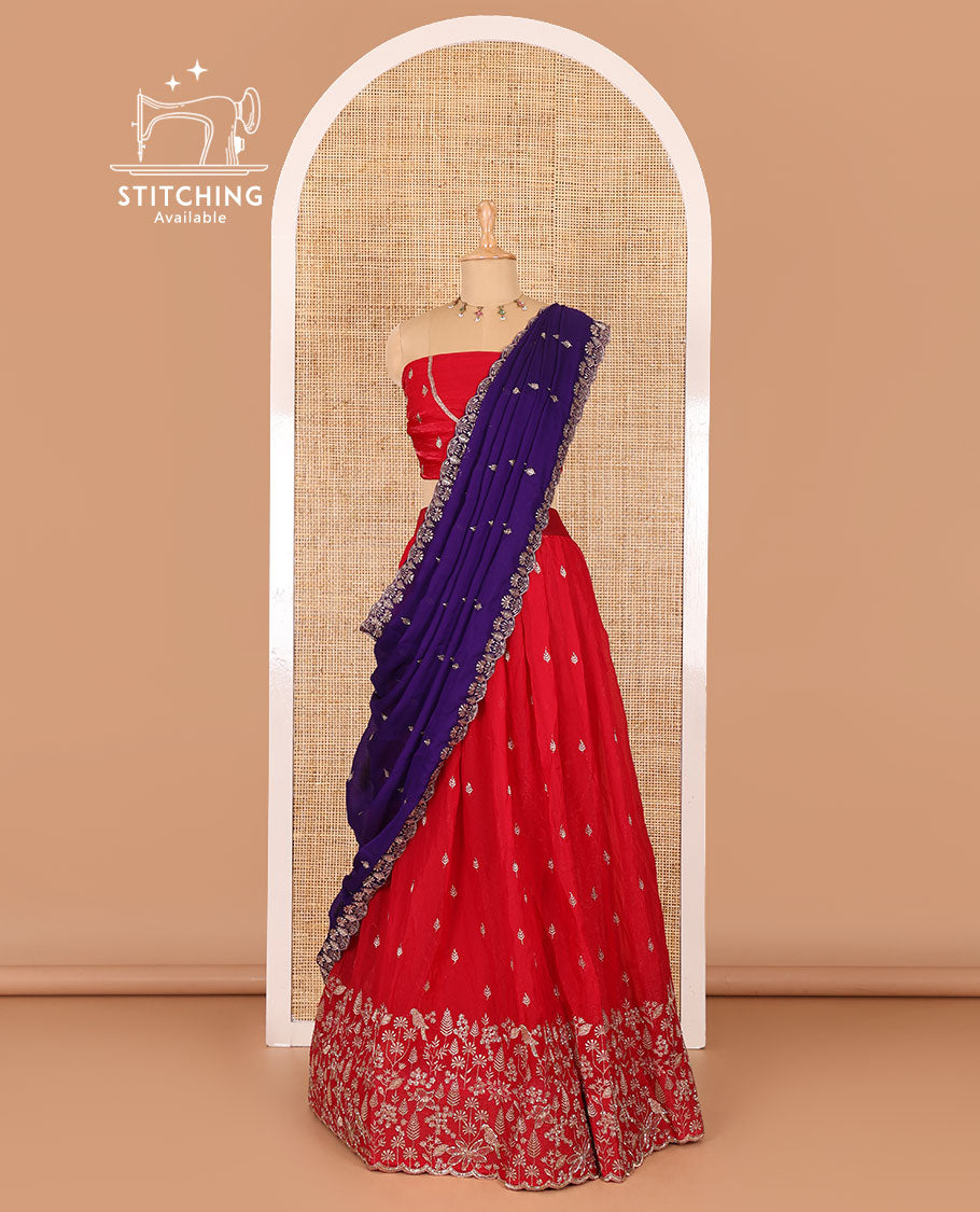Red half-saree, floral and bird motifs embroidered velvet organza top, matching embroidered blouse, and contrast scallop embroidered syska georgette dhavani