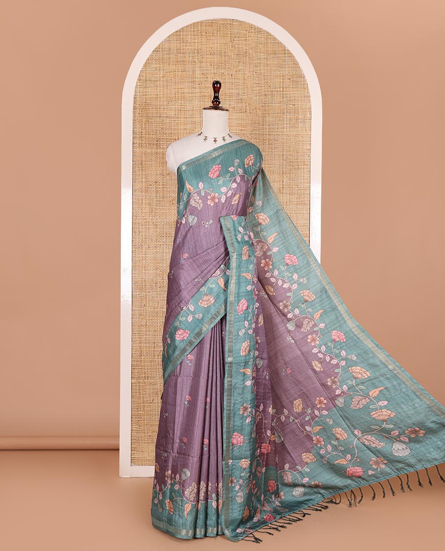 Purple floral motifs printed katan silk saree, contrast scallop floral printed with piping zari border, and contrast buttas blouse