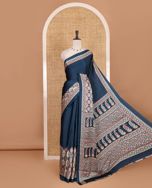 Blue plain gajji silk saree with ajrak printed border, ajrak printed geometric pallu, and printed blouse