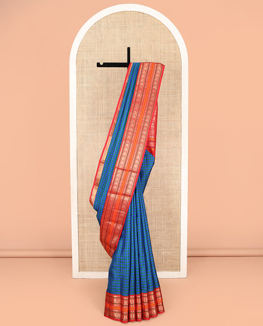 Blue and Green Kanchipuram Silk Saree, Decked Up with Checked Design on Its Body, Complemented by a Contrast Border of Thilakam Mokku, Mayil, Laddu Kamalam, and Rudraksham Designs, Pallu Steeped with Traditional Designs, and Paired with a Contrast Blouse