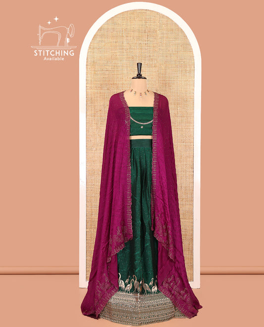 Bottle Green Half-Saree Set, Richly Detailed with Stone Work and Bird Motifs Embroidery on Its Satin Georgette Skirt, Highlighted by Embroidered Border, Paired with a Matching Blouse, and Comes with a Contrast Scallop Stone Work Dupatta