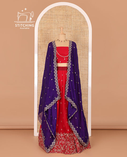 Red half-saree, floral and bird motifs embroidered velvet organza top, matching embroidered blouse, and contrast scallop embroidered syska georgette dhavani