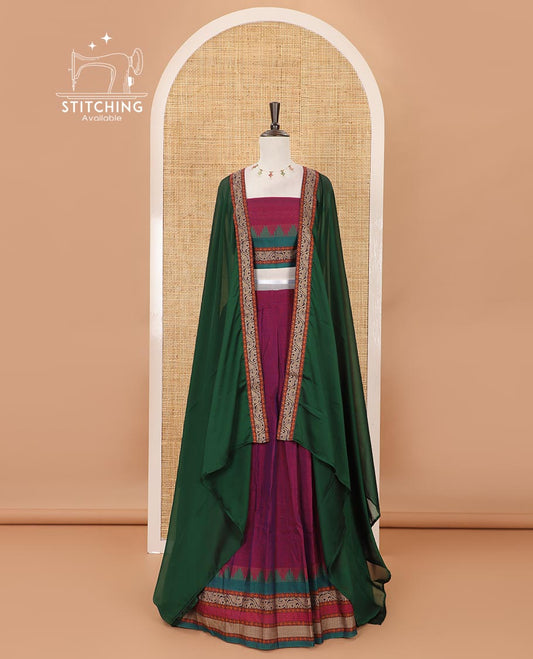 Magenta mercedised cotton half-saree, contrast traditional resham thread border skirt, matching blouse & contrast green thread border georgette dhavani