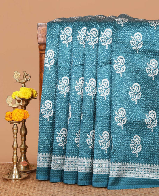 Blue floral printed litchi crushed saree, geometric printed border, floral-geometric printed pallu & triangle motif printed blouse