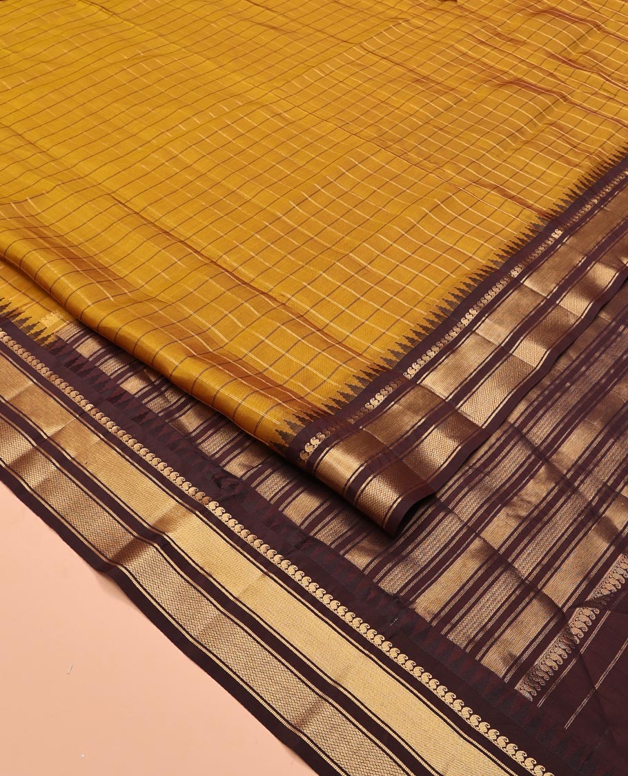 Mehendi Green and Brown Vasundhara Lite Silk Mix Saree, Graced with Checked Design All Over Its Body, Complemented by a Contrast Thazampoo Rekku Border of Manga Mokku, Muthu, and Mayil Kann Designs, Grand Pallu, and Paired with a Contrast Blouse