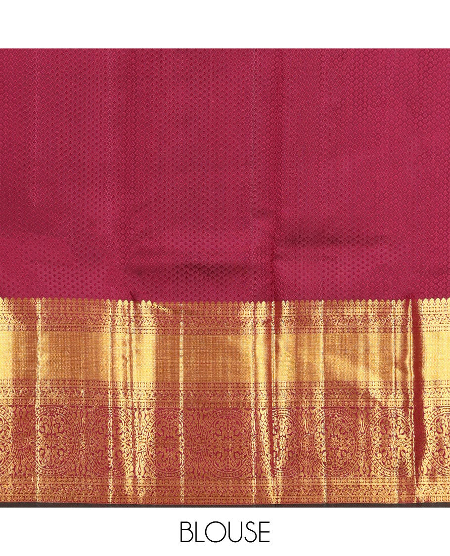 Maroon Kanchipuram Wedding Silk Saree, Mesmerized with Jacquard Design on Its Body, Highlighted by Zari Border of Thilakam Mokku, Rudraksham, Mayil Kann, and Chakram Designs, Grandly Woven Pallu, and Paired with a Matching Blouse