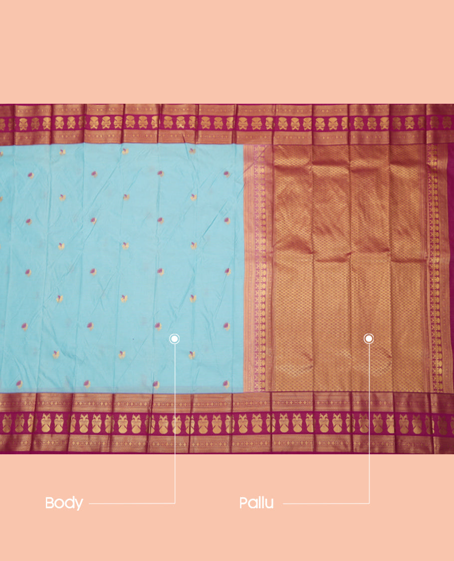 Blue Budget Silk Saree, Embelished with Horse Buttas and Stripes, a Contrast Iruthalai Pakshi Zari Border, a Jaal Pallu and a Contrast Blouse