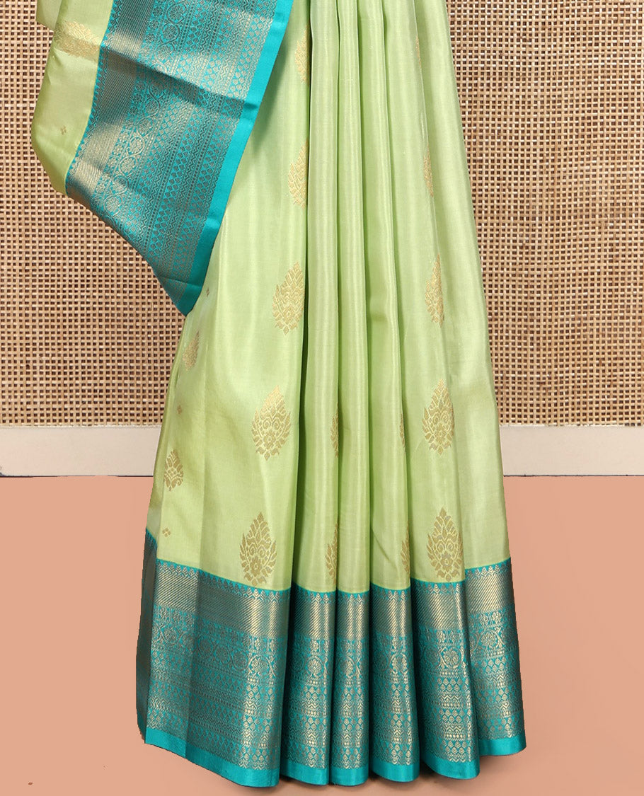 Green Vasundhara Lite Silk Mix Saree, Gleamed Up with Zari Buttas, a Contrast Traditional Zari Border, an Intricate Pallu, and a Contrast Blouse