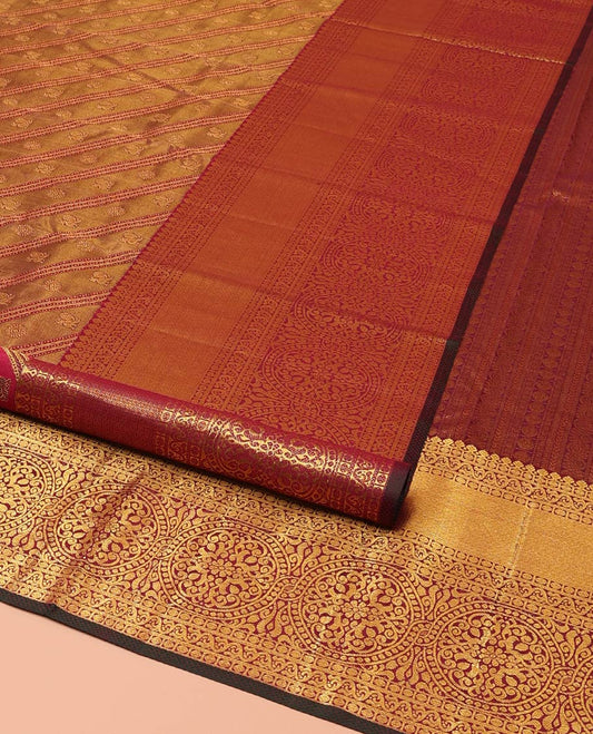 Maroon Samudrika Silk Saree, Mesmerized with Jacquard Design on Its Body, Highlighted by Zari Border of Thilakam Mokku, Rudraksham, Mayil Kann, and Chakram Designs, Grandly Woven Pallu, and Paired with a Matching Blouse