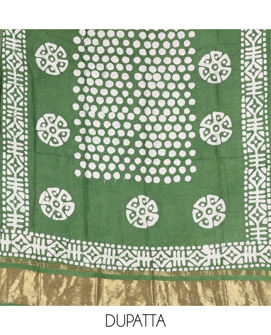 Green material chudidar set, polka dots batik printed modal chanderi top, batik motifs printed bottom, and a batik motifs printed modal chanderi dupatta
