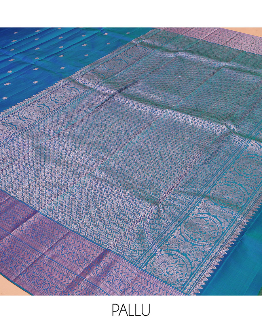 Blue Kanchipuram Silk Saree, Graced with Mayil and Chakram Thread Buttas on Its Body, Highlighted by a Self-Border of Rekku, Neli, Kathir, and Kodi Visiry Designs, Pallu of Jaal Designs, and Paired with a Matching Blouse