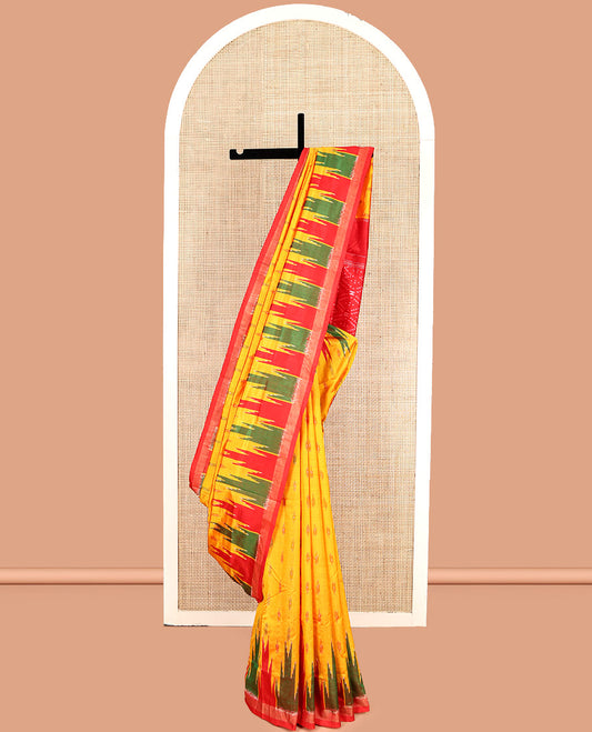 Yellow Pochampally Ikat Silk Saree, Ornamented with Ikat Buttas, Complemented by a Contrast Temple Border, Striped Pallu, and a Contrast Blouse