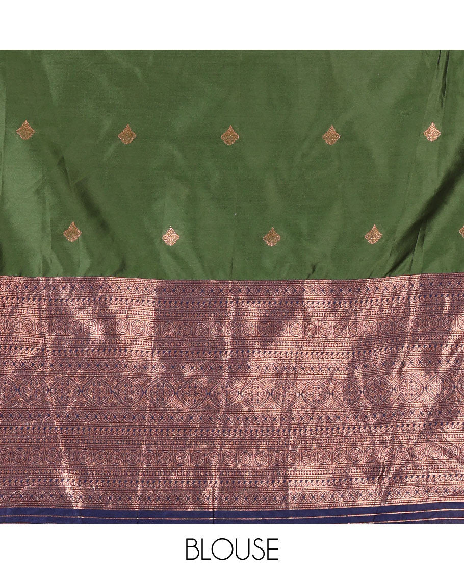 Bottle green taffeta silk half-saree, zari buttas and contrast traditional zari bordered skirt, a matching blouse, and contrast embroidered satin georgette  dhavani