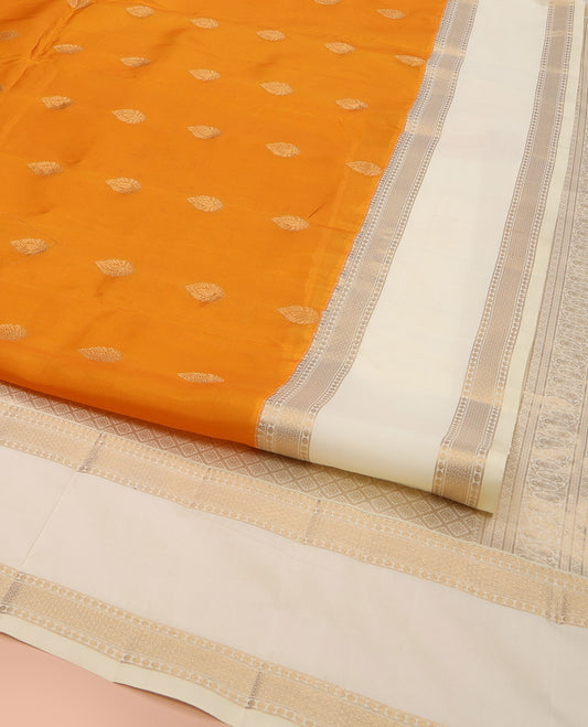 Orange Vasundhara Lite Silk Mix Saree, Decked Up with Zari Buttas All Over Its Body, Complemented by a Contrast Rettai Pettu Border, Grand Jaal-Patterned Pallu, and Paired with a Contrast Blouse