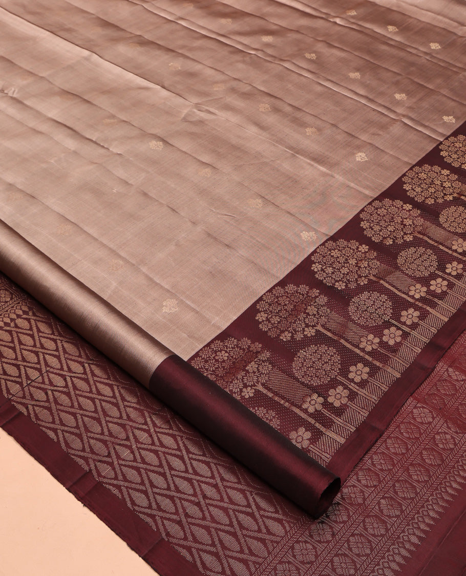Grey Mayuri Lite Silk Mix Saree, Sparsely Woven with Zari Buttas All Over Its Body, Complemented by a Contrast Floral Design Border, Grand Jaal Pallu, and Paired with a Contrast Blouse