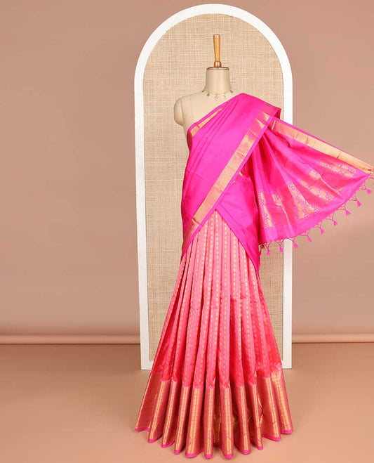 Pink floral buttas silk half saree with contrast border of thilakam mokku, kodi visiry design, zari design border & intricate zari design dhavani