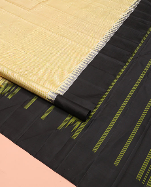 Yellow micro-checked Kanchipuram silk saree, contrast thazampoo rekku border, and striped pallu