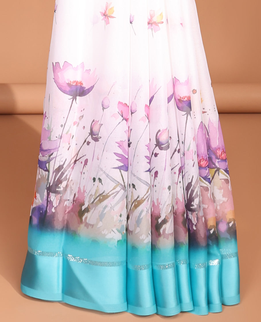 White digital floral design moss chiffon saree with contrast blue zari border & floral design pallu