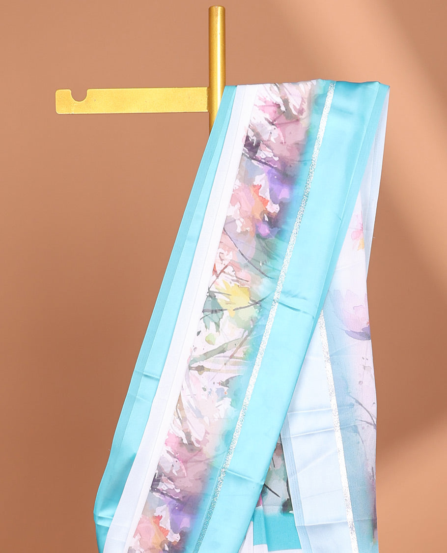 White digital floral design moss chiffon saree with contrast blue zari border & floral design pallu