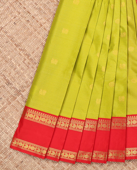 Green Budget Silk Saree, Sparsely Sparkled with Zari Buttas and Stripes, Complemented by a Contrast Traditional Zari Rettai Pettu Border, Grand Jaal Pallu, and a Contrast Blouse