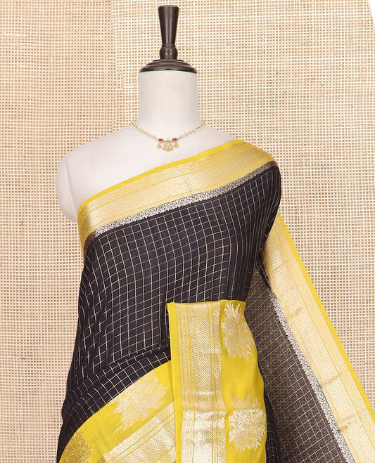Black Assam Silk Saree Subtly Sparkled with Zari Checks, Complemented by Contrast Traditional Zari Border of Floral Designs, a Captivating Pallu of Zari Stripes, and Paired with a Contrast Blouse